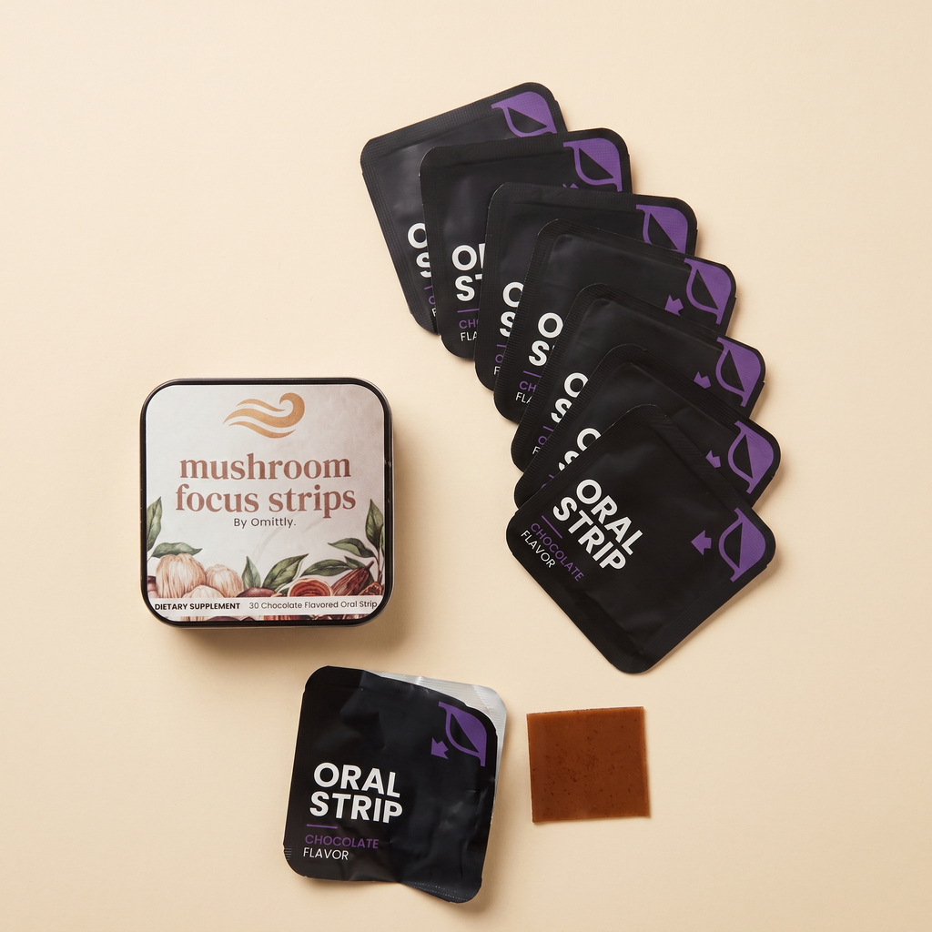 Omittly Focus Strips tin with chocolate strips fanned out.